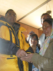 Home Minister P Chidambaram handing over the key to the beneficiary of the house